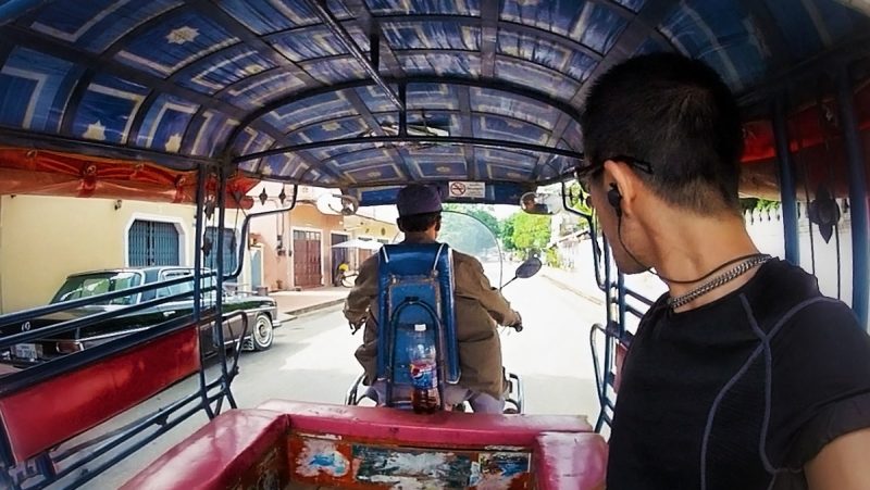 Vagabonding is The Cure For Materialism Tuk Tuk ride in Luang Prabang /// Vinjatek