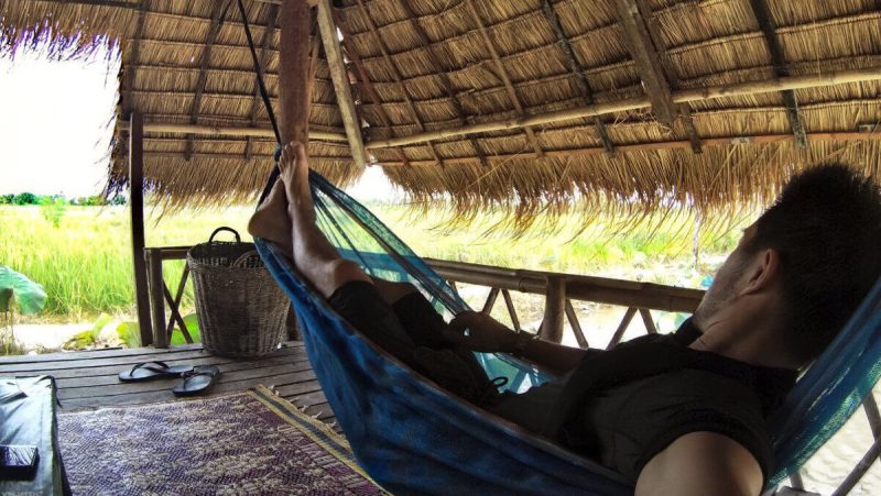 The Sleepless Elite Chilling on a hammock in a bungalow in Vietnam /// Vinjatek